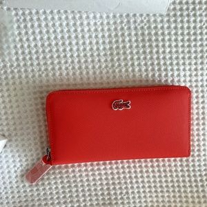 Lacoste zip wallet coral color